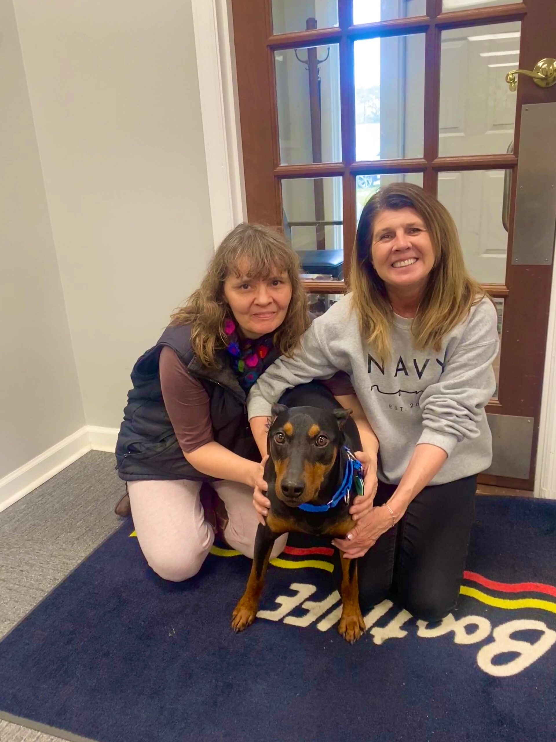 Robin and Maike with Schmitty the office dog